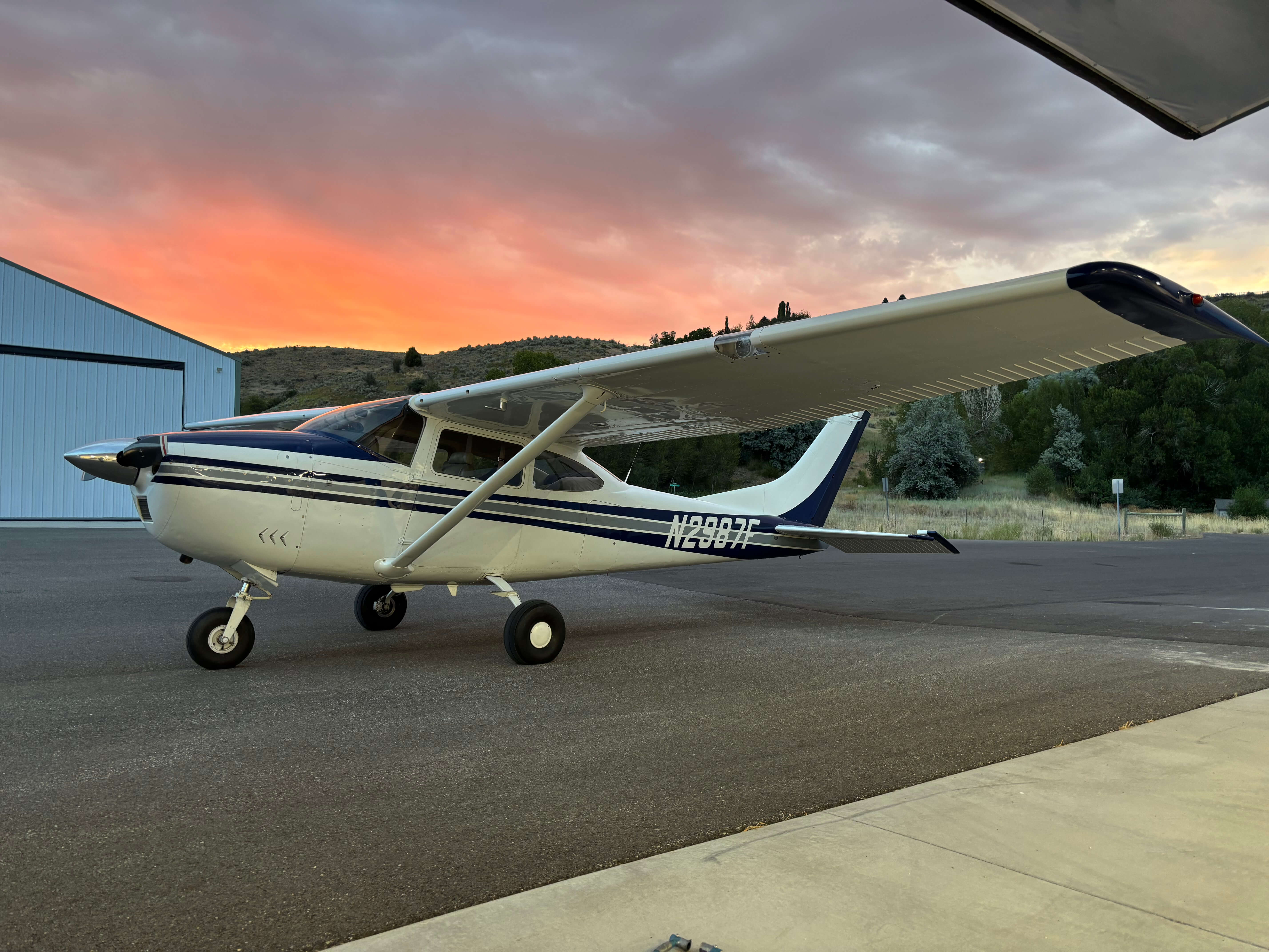 Nate's Cessna 182 on the ramp at sunset